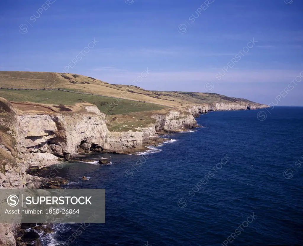 England, Dorset, Jurassic Coastline, View East Towards Seacombe Quarry And Distant Anvil Point Lighthouse