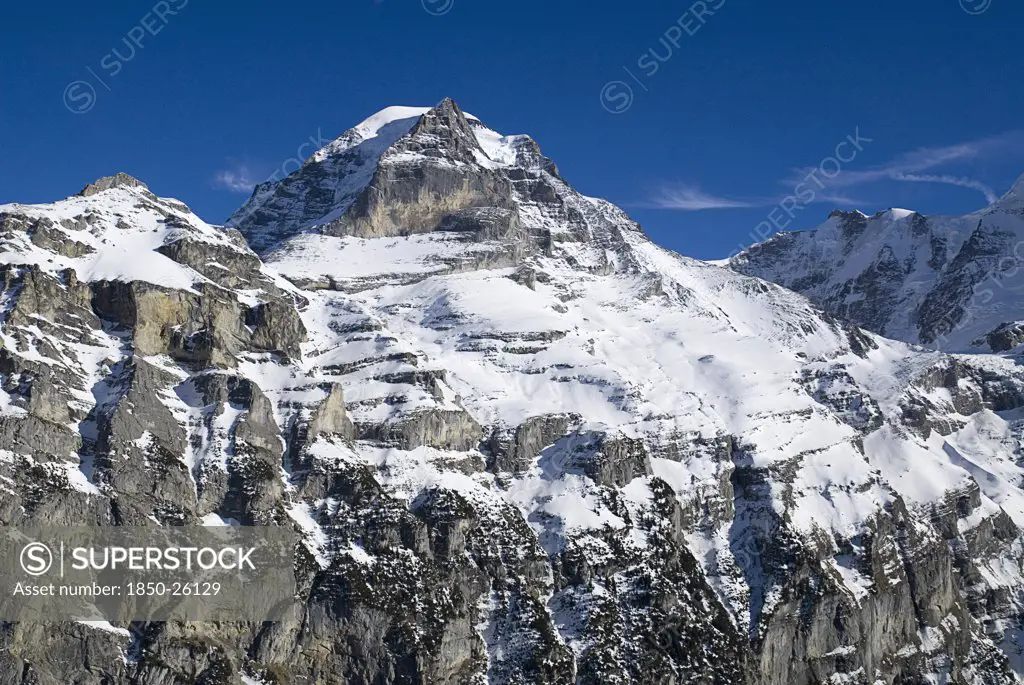 Switzerland, Bernese Oberland, Murren, Summit Of The Monch Mountain From Outskirts Of Murren.