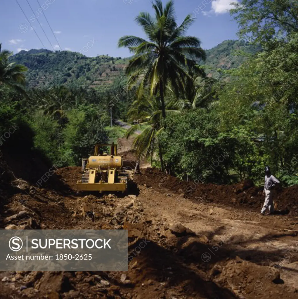Indonesia, Lombok, Senggigi, 'Bansal Road Repairing After Heavy Rain Using Caterpillar Bulldozer, Tarmac Road Coconut Palm, Trees & Terraced Fields Behind. Lombok Barat, Ntb J 6574 '