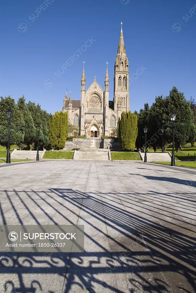Ireland, Monaghan, Monaghan Town, St Macartan'S Cathedral With Shadow Of Main Gate In Foreground.