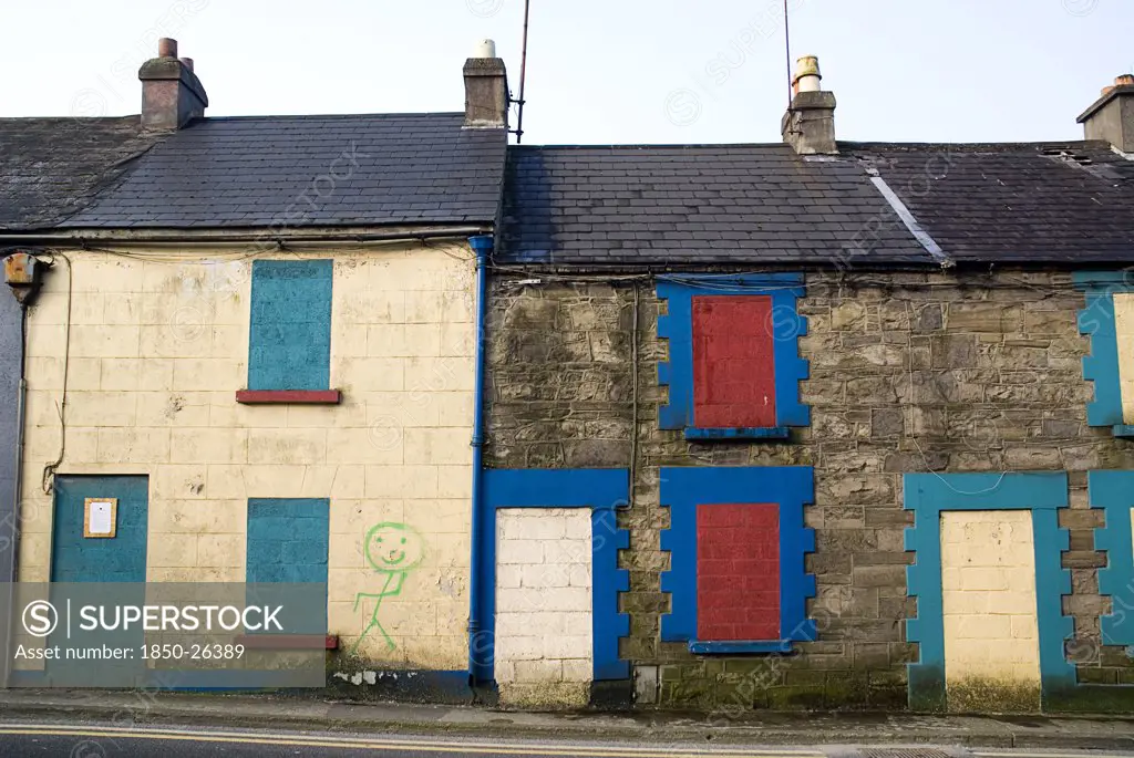 Ireland, Sligo, Sligo , Urban Decay. Derelict Abandoned Houses In Centre Of Sligo With Boarded Up Doorways And Windows.
