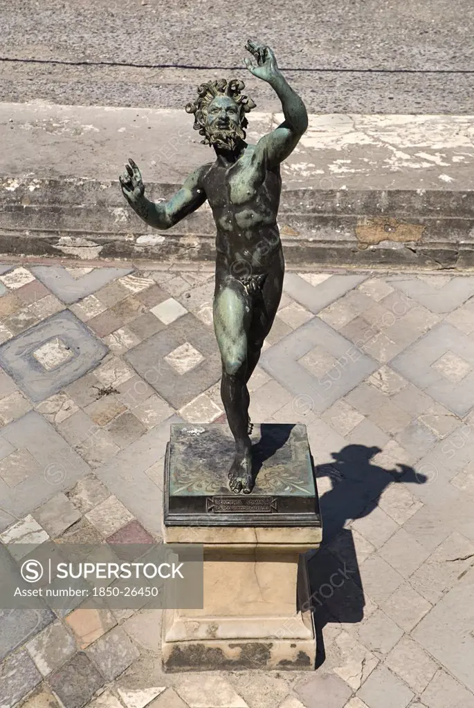 Italy, Campania, Pompeii, House Of The Faun. Statue In The Atrium Of The House