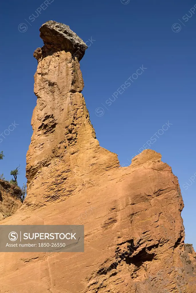 France, Provence Cote DAzur, Vaucluse, 'Colorado Provencal.  Cheminee De Fee Or Fairy Chimneys.  Tall, Eroded Ochre Rock Pinnacle.'