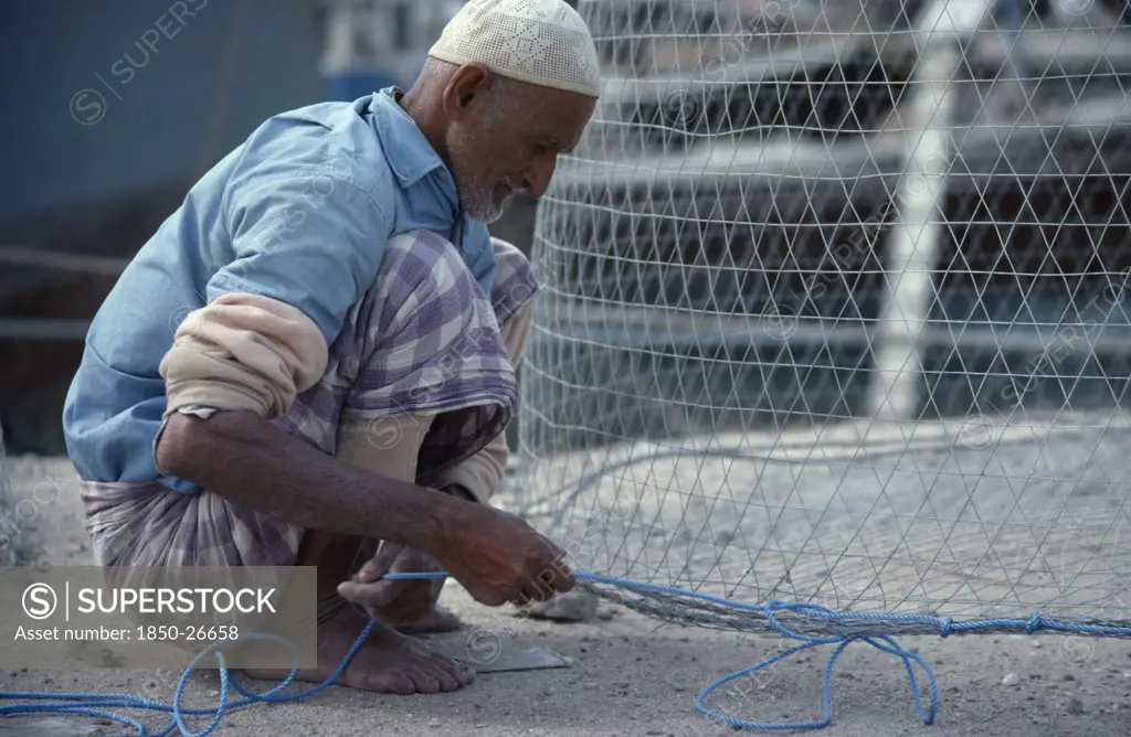 Kuwait, Industry, Fisherman Preparing Nets