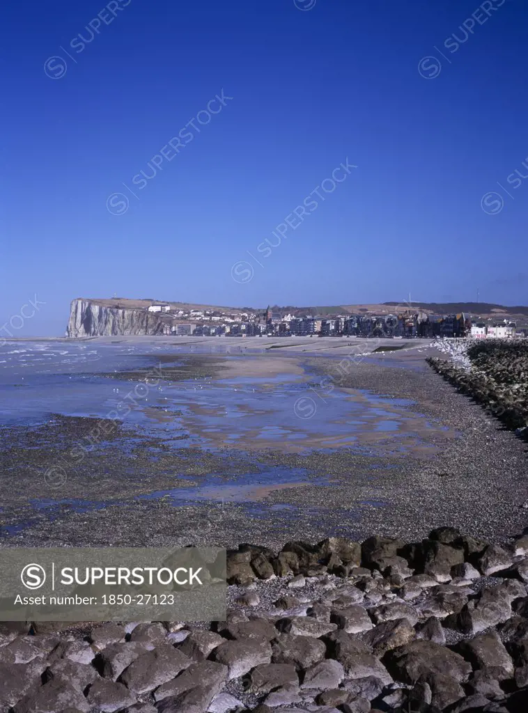 France, Normandy, Mers Les Bains, View North East Along Shoreline By Town Mers Les Bains. Chalk Cliffs Beyond And Tide Out.