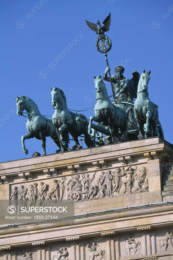 Germany, Berlin, 'The Brandenburg Gate.  Angled View Of The Quadriga On Top Of The Gate.  Chariot Drawn By Four Horses Driven By Victoria, Roman Goddess Of Victory.'
