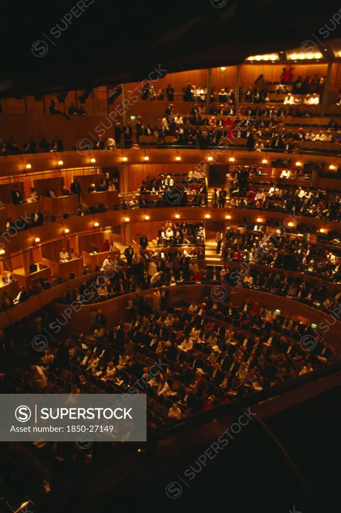 England, East Sussex, Glyndebourne, Interior Of Auditorium With Attendees Taking Their Seats Before Opera Performance.