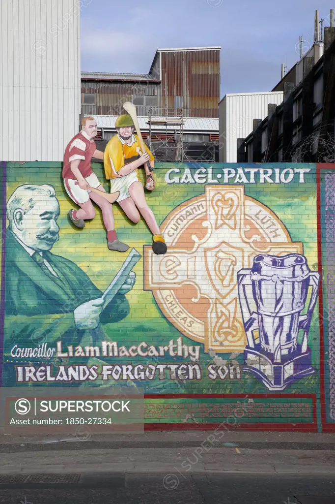 Ireland, North, Belfast, 'West, Falls Road. Mural Depicting Liam Mccarthy And Some People Playing Hurling'