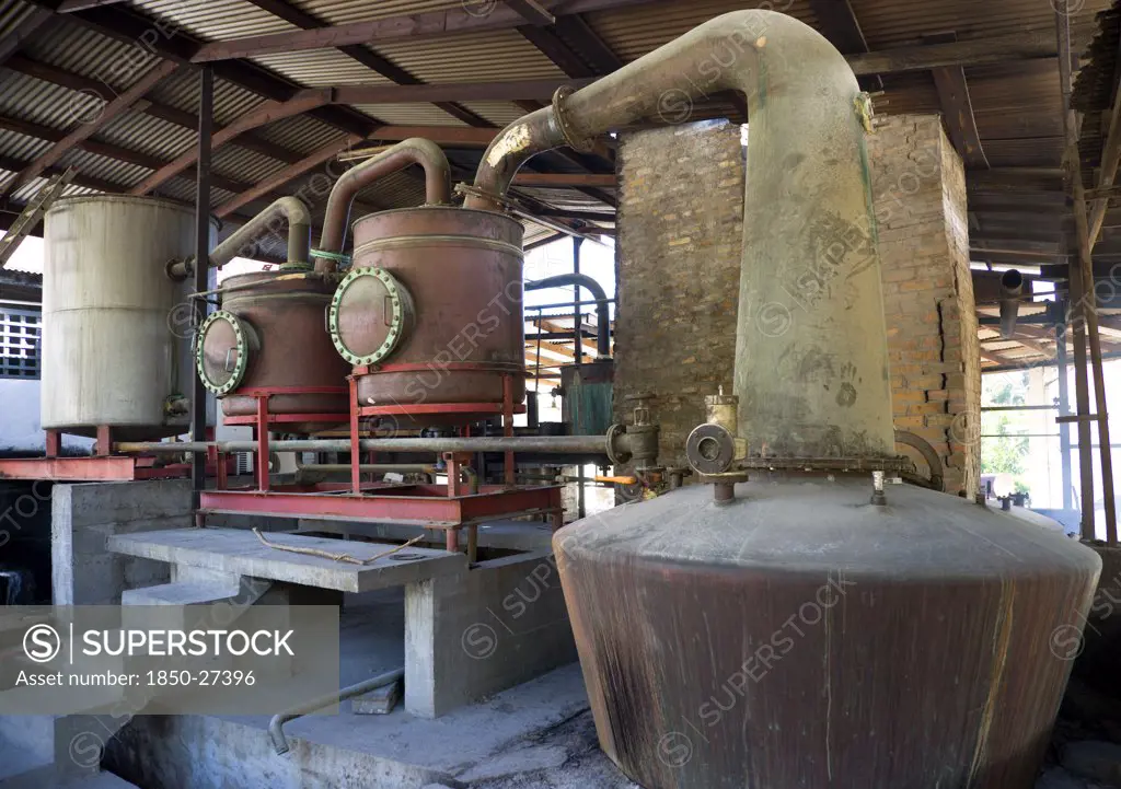 West Indies, Grenada, St Patrick, The Wood Fired Copper Stills At The River Antoine Rum Distillery.