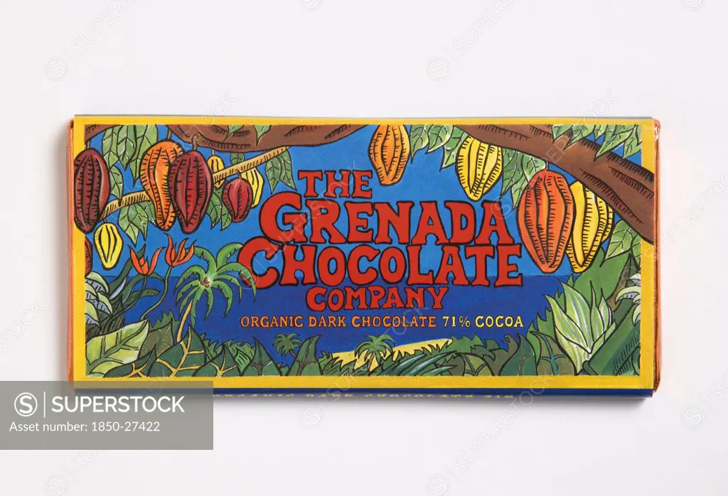 West Indies, Grenada, St Patrick, Bar Of 71% Percent Cocoa Organic Dark Chocolate Form The Grenada Chocolate Company In Colourful Wrapper.