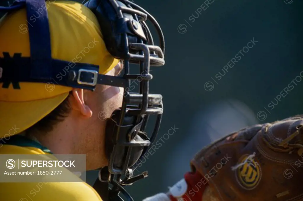 Sport , Ball Games, Baseball , Portrait Of Catcher Wearing Protective Helmet With Mask And Golve.