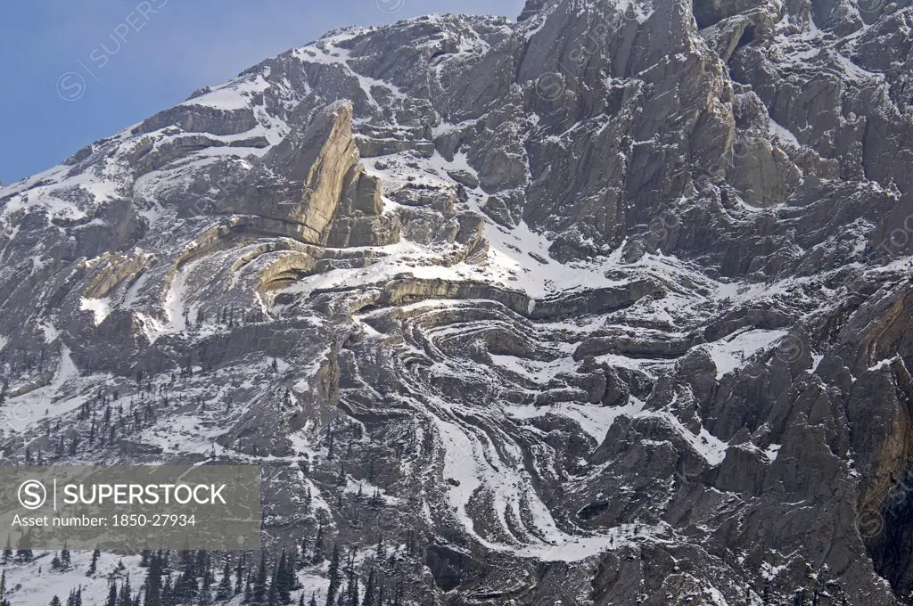 Canada, Alberta , Kananaskis, A Light Sprinkling Of Snow Makes It Easier To See The Complex Rock Formation Of The South Face Of Mount Evan Thomas.
