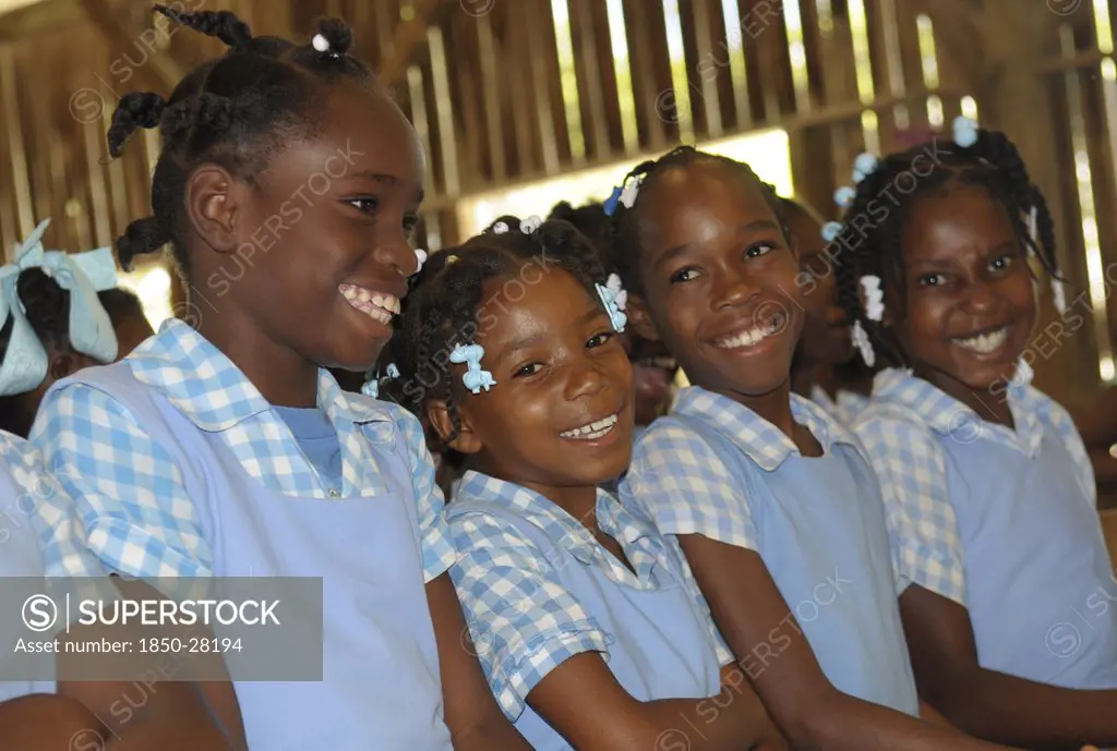 West Indies, Haiti, Isla Laganave, Young School Girls In Blue Uniforms