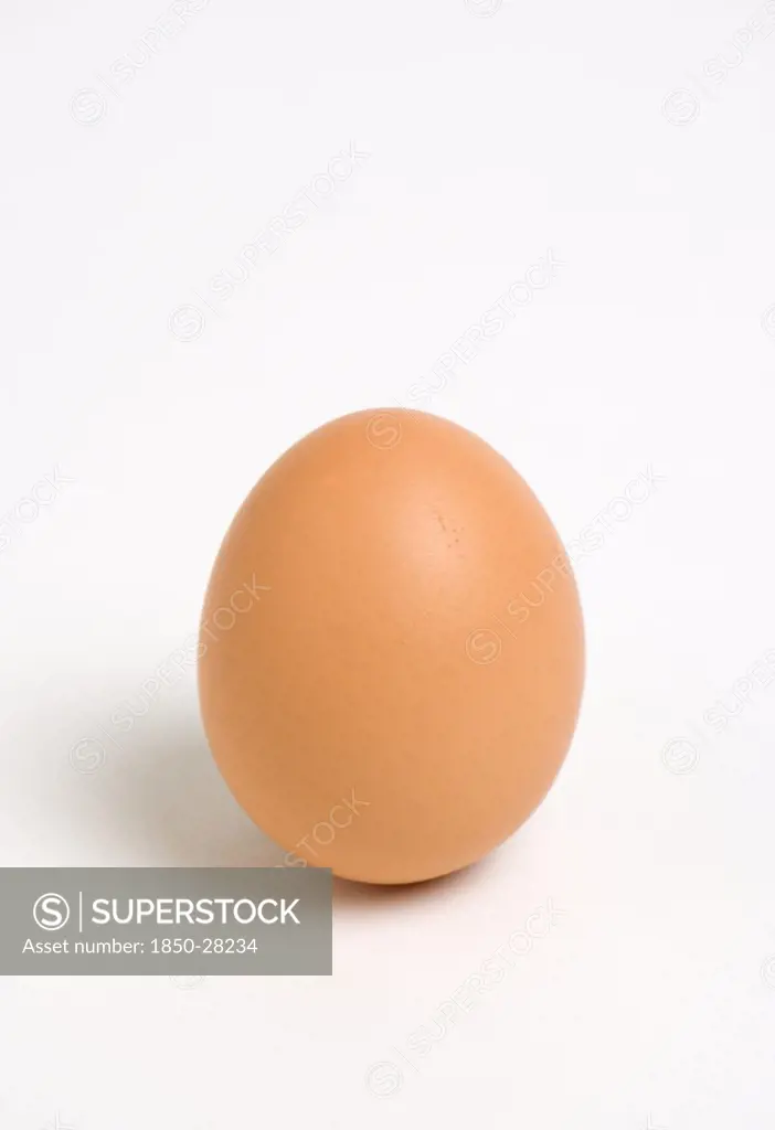 Food, Uncooked, Eggs, One Hard Boilded Free Range Egg On A White Background.