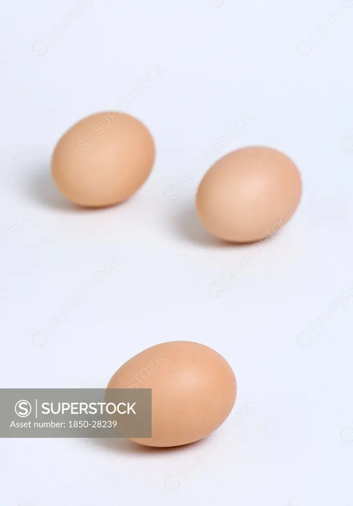 Food, Uncooked, Eggs, Three Free Range Eggs On A White Background.