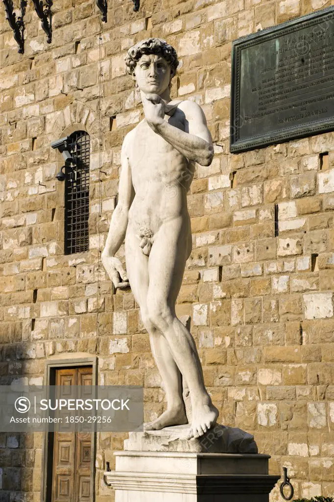 Italy, Tuscany, Florence, Replica Of Renaissance Statue Of David By Michelangelo In The Piazza Della Signoria Beside The Palazzo Vecchio.