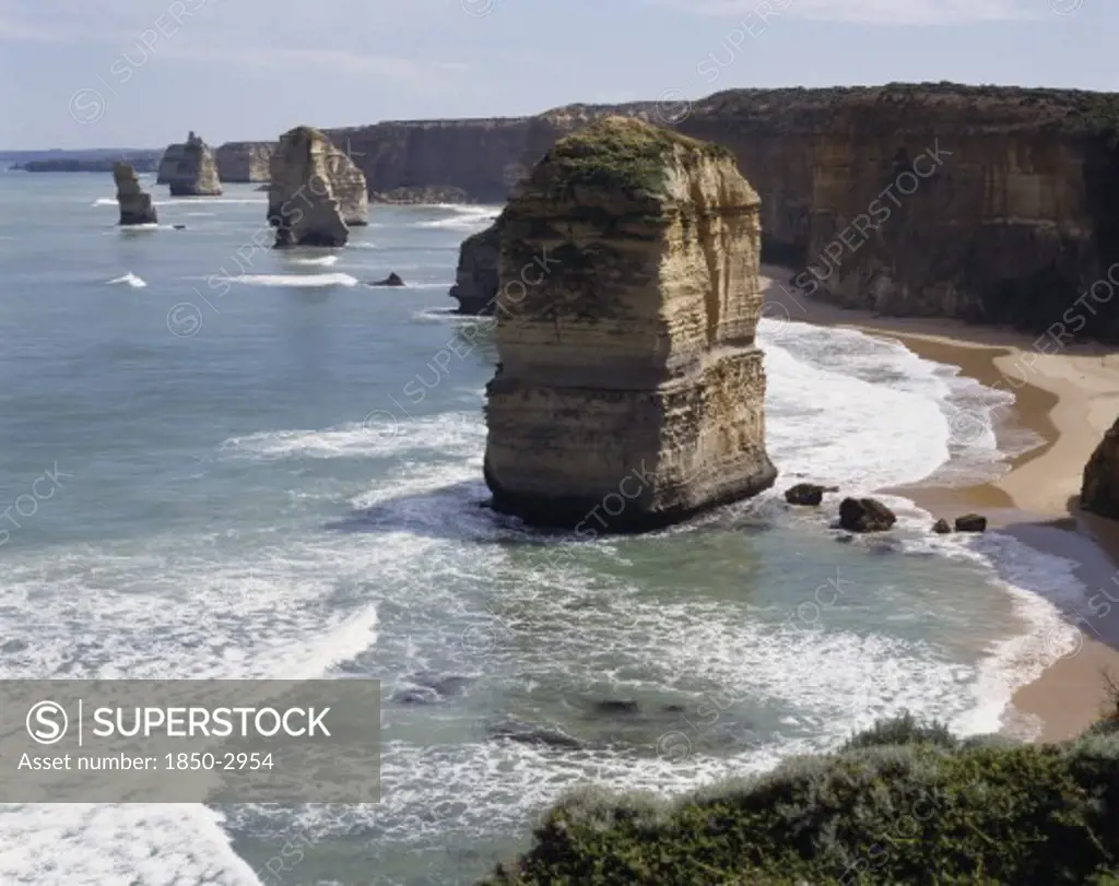 Australia, Victoria, Great Ocean Road, The Twelve Apostles Along The Rocky Coastline With Sandy Bays