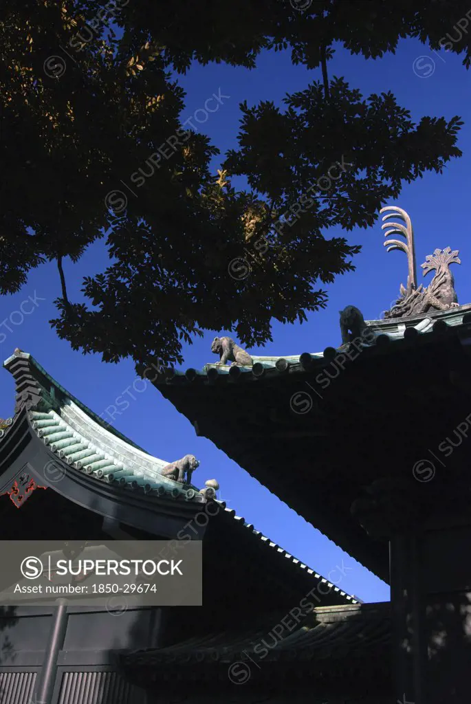 Japan, Honshu, Tokyo, Kanda  Yushima Seido Confucian Shrine  Details Of Roof Wall Surrounding Shrine Compound  Distictive Black Color And Guardian Tiger And Dragon Guardian Figures.