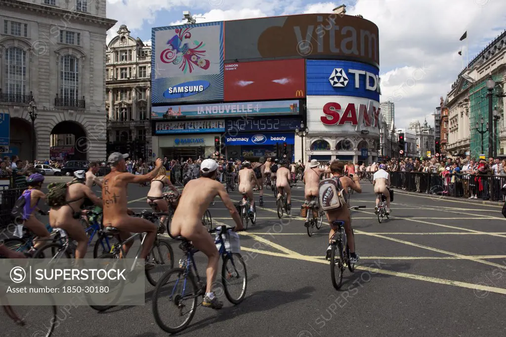 England, London, Picadilly Circus  Naked People Riding Their Bicycles While Participating At The World Naked Bike Ride Protest Parade.
