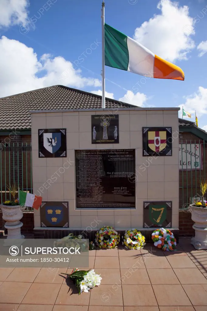 Ireland, North, Belfast, Andersonstown  South Link  Ira Belfast Brigade Memorial With Easter Flowers.