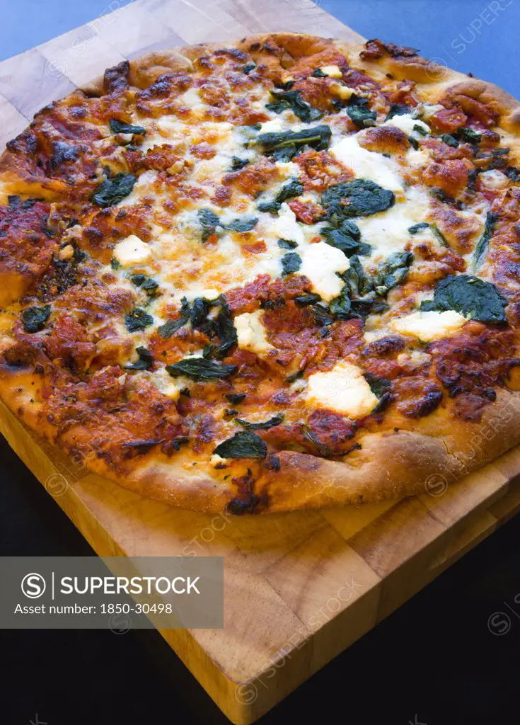 Food, Cooked, Pizza, Italian Spinach And Ricotta Cheese Pizza On Wooden Cutting Board.