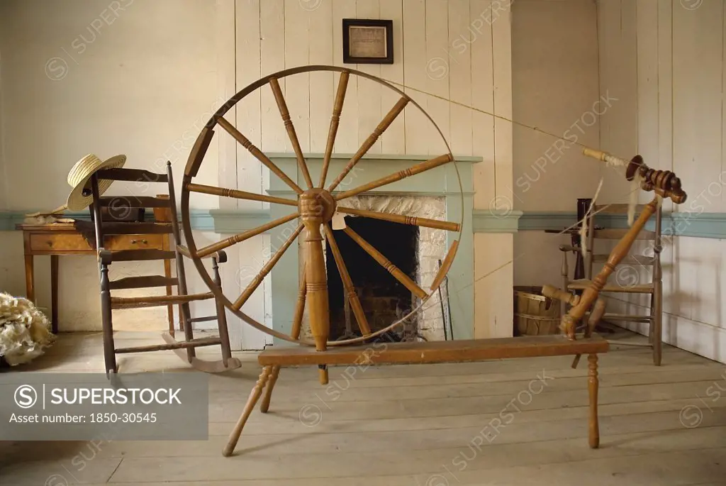 Ireland County Tyrone Omagh, Ulster American Folk Park  Spinning wheel in Pennsylvania Log Farmhouse