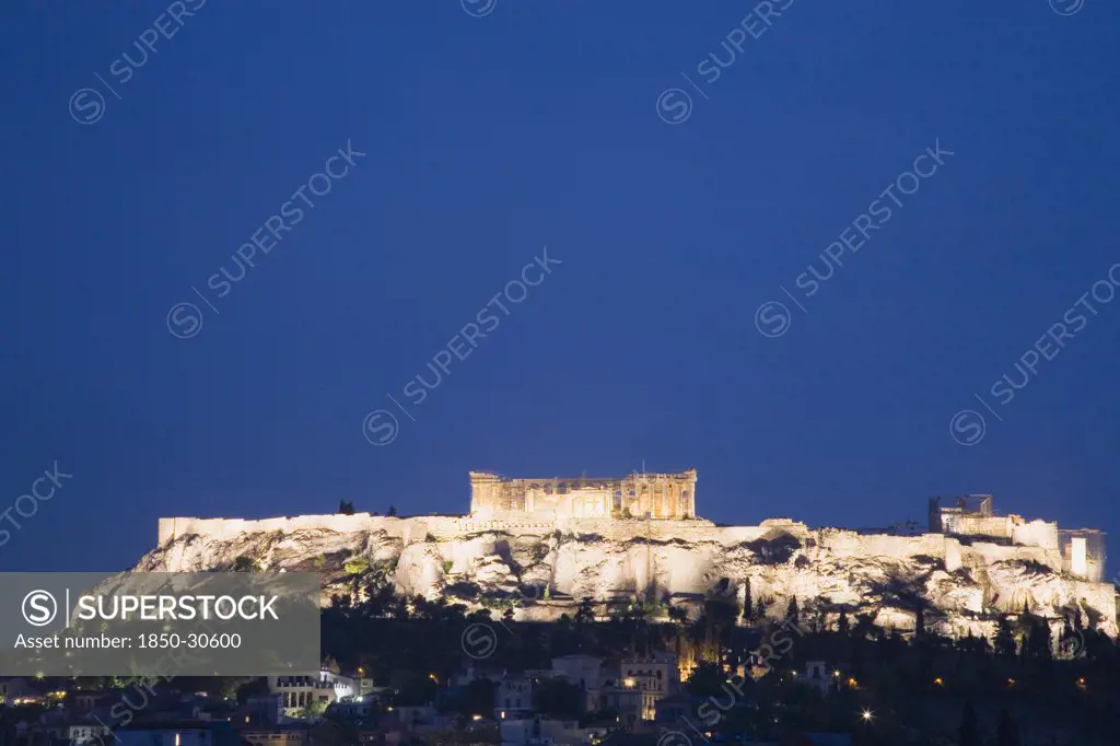 Greece Attica Athens, View towards the Acropolis illuminated at dusk
