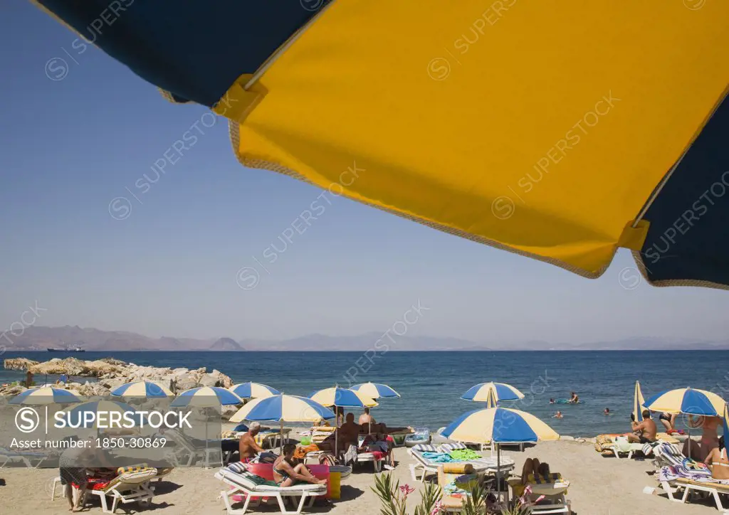 Greece Dodecanese Islands Kos, Sunbathers on loungers