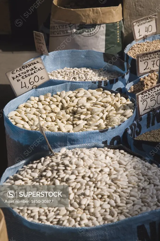 Greece Attica Athens, Sacks of beans for sale on food stall in central market