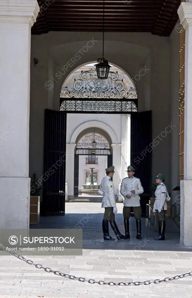 Chile Santiago, Main entrance of the Palacio de la Moneda Presidential Palace guarded by high booted carabineros police