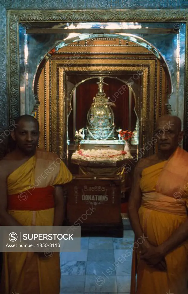 Sri Lanka, Kandy, Temple Of The Tooth. Guardians Of The Tooth Standing Outside The Room Holding The Visible Casket Of The Tooth Dalada Maligawa