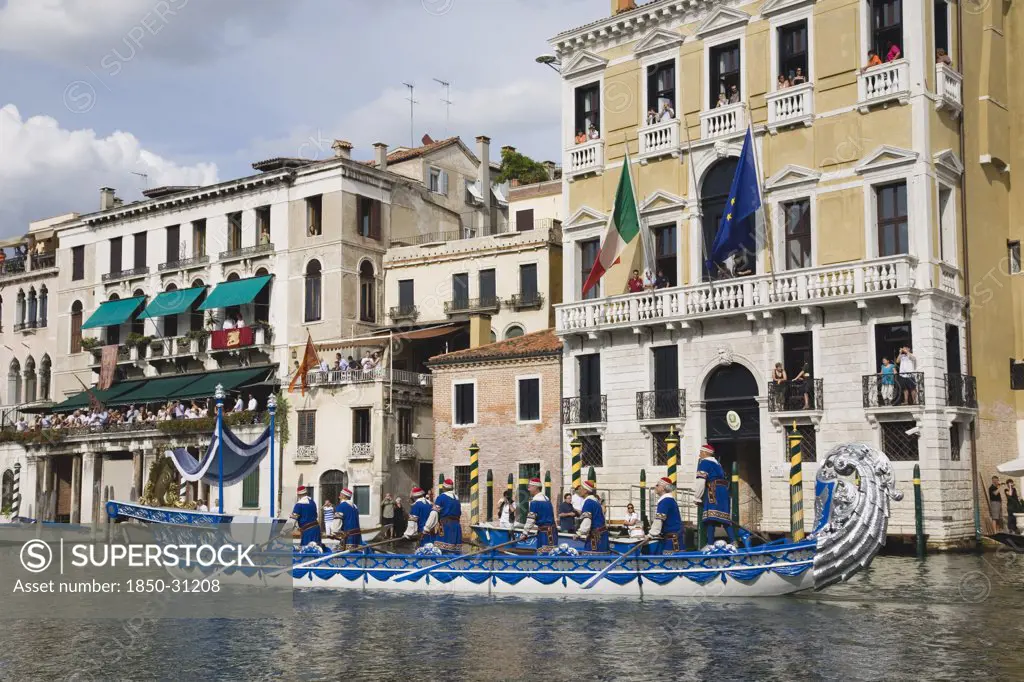 Italy Veneto Venice, Participants in the Regatta Storico historical annual regatta wearing traditional costume rowing