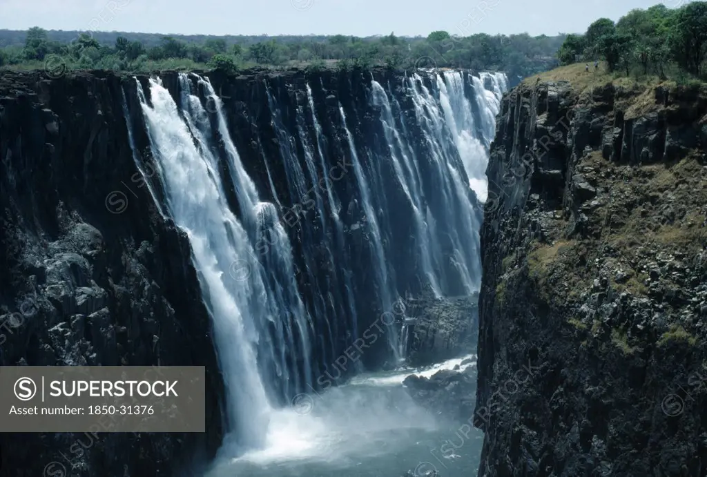 Zimbabwe Victoria Falls, Zambezi River plunging into gorge