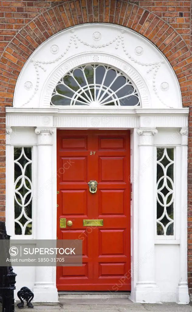 Ireland, County Dublin, Dublin City, Red Georgian door in the city centre south of the Liffey River.