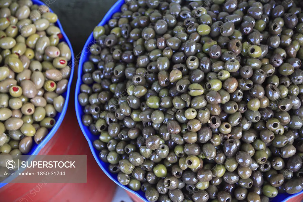 Albania, Tirane, Tirana, Bowls of olives displayed for sale in the Avni Rustemi Market.