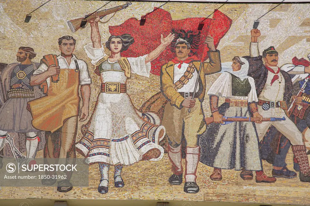 Albania, Tirane, Tirana, National History Museum. Detail of mosaic on the exterior facade of the National History Museum in Skanderbeg Square representing the development of Albanias history.