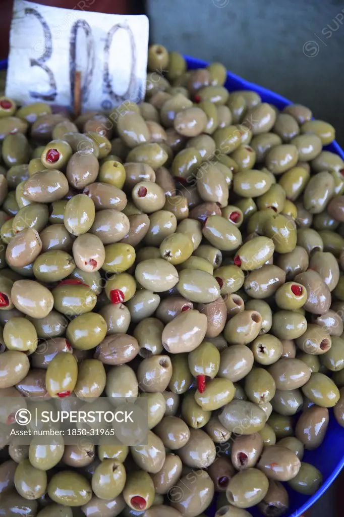 Albania, Tirane, Tirana, Display of stuffed  green olives for sale in the Avni Rustemi Market.
