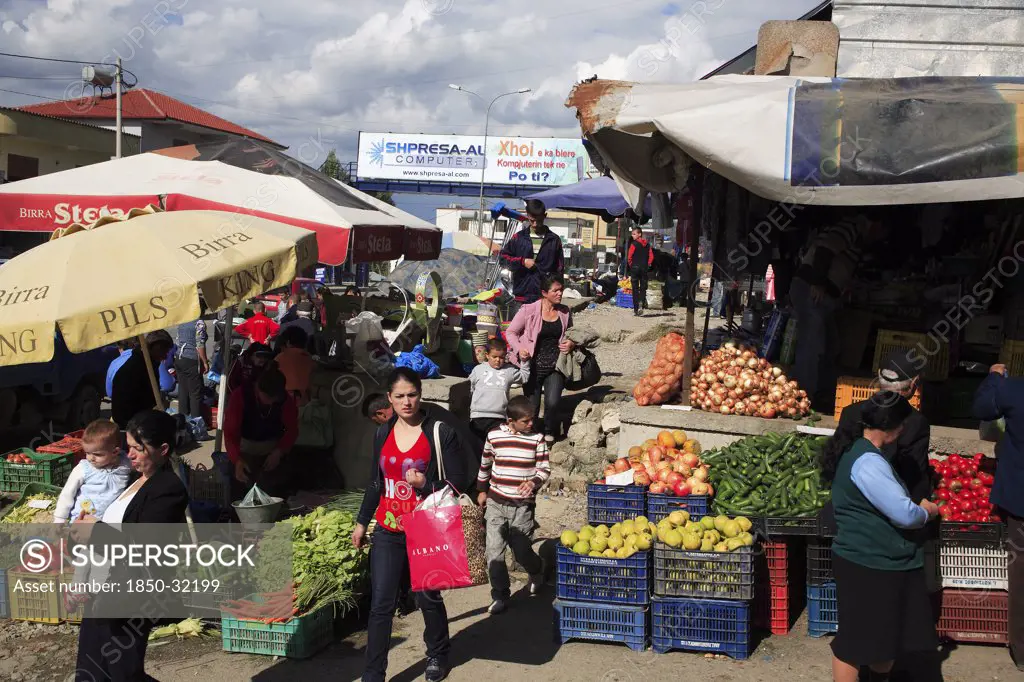 Albania, Tirane, Tirana, Busy market in the northern part of the city with street stalls selling fruit and vegetables.