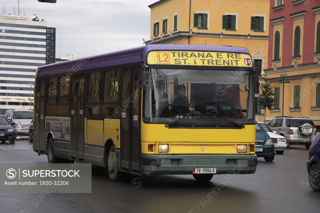 Albania, Tirane, Tirana, Public bus amongst other traffic.