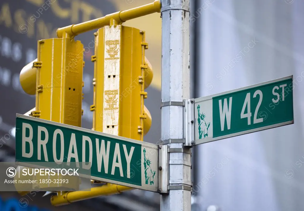 USA, New York, New York City, Manhattan  Roadsigns for Broadway at West 42nd Street in the theatre district with traffic lights.