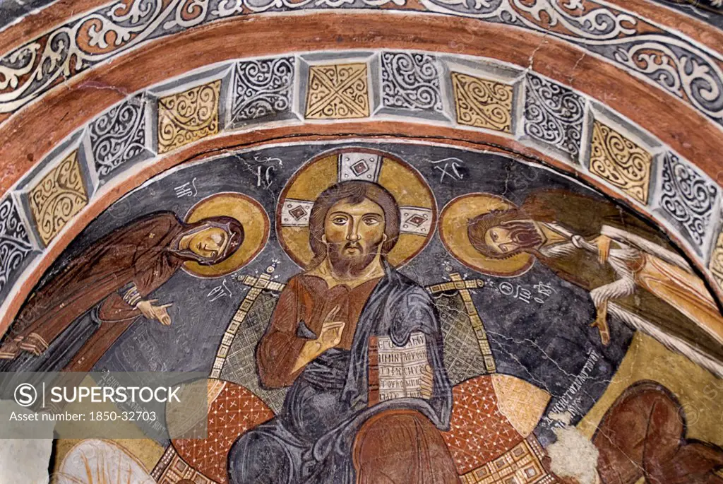 Turkey, Cappadocia, Goreme, Goreme Open Air Museum, The Dark Church, So named because it had very few windows. The frescoes date from the 11th century. Dark Church is known in Turkish as Karanlik Kilise, Christ as Pantocrator.