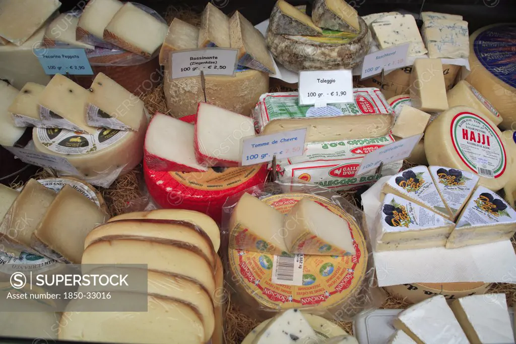 Austria, Vienna, Dispaly of cheeses in the Naschmarkt.