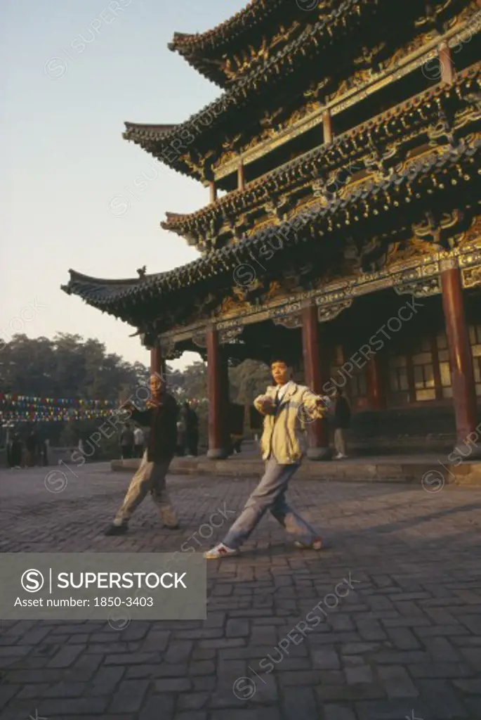 China, General, Tai Chi, Two Men Doing Morning Exercises Outside Buddhist Temple