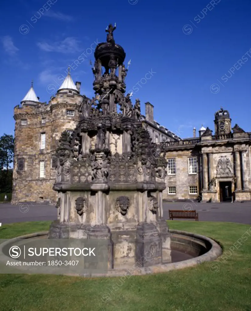 Scotland, Lothian, Edinburgh, Holyrood House Facade. Entrance Door With Ornate Stone Fountain In Foreground