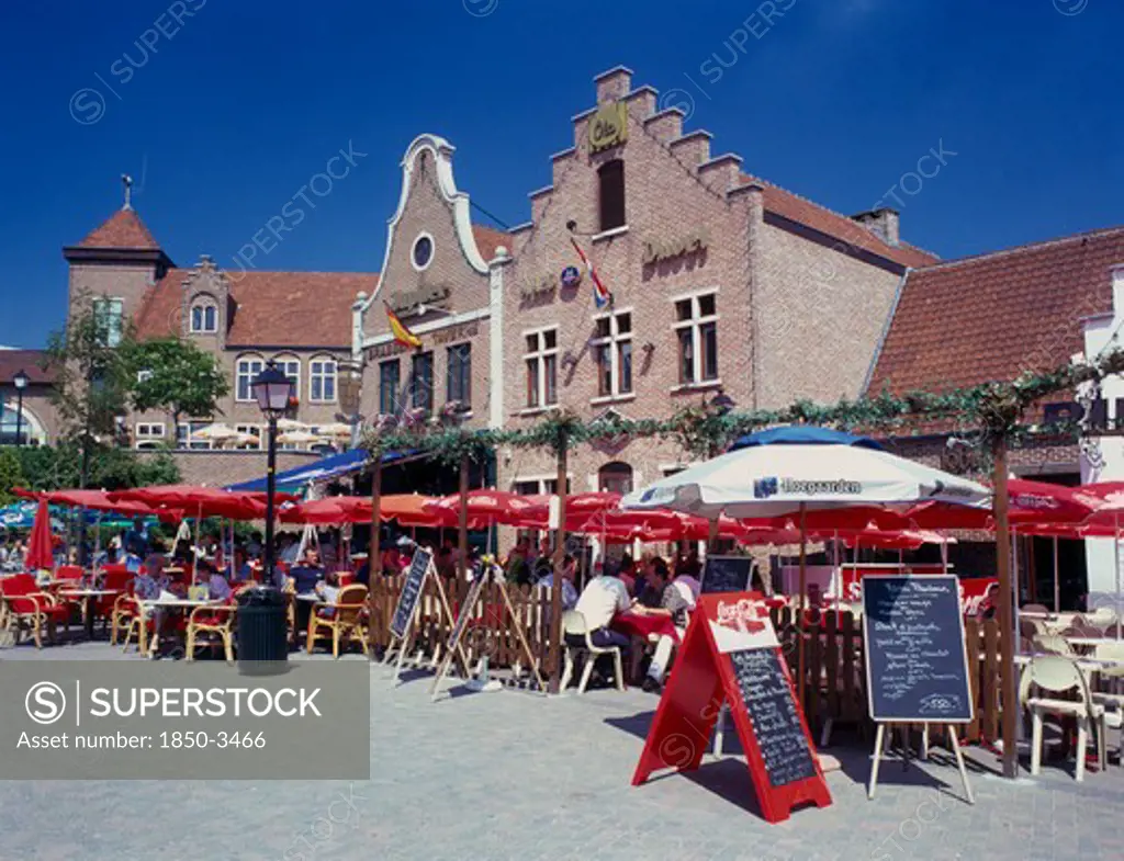 Belgium, Brussels, Heysel, Outdoor Restaurants And Umbrellas In The Bruparck Complex.