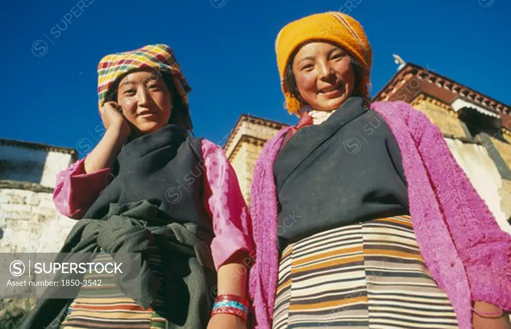 Tibet, Lhasa, Sera Monastery, Two Tibetan Women Outside Monastery