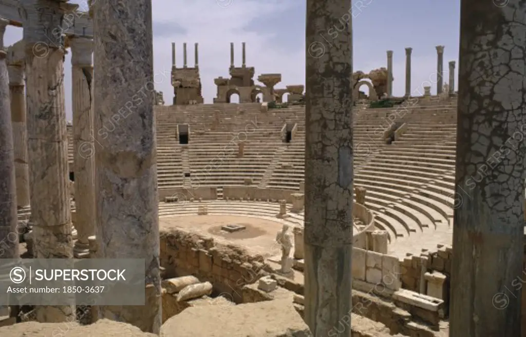 Libya, Tripolitania, Leptis Magna, The Roman Amphitheatre Seen From The Stage Area Through Columns