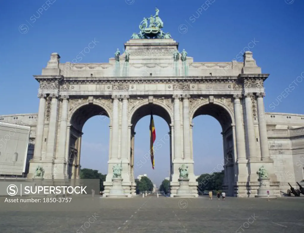 Belgium, Brabant, Brussels, 'Arc Du Triomphe, The Arch In The Cinquantenaire Park And Hanging Belgian Flag.'