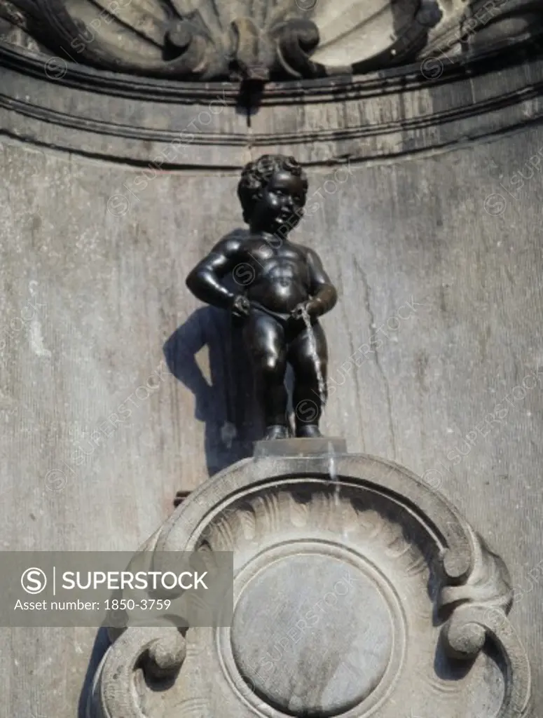 Belgium, Brabant, Brussels, 'Manneken Pis, A Statue Of A Little Boy Urinating Into The Fountain'S Basin.'