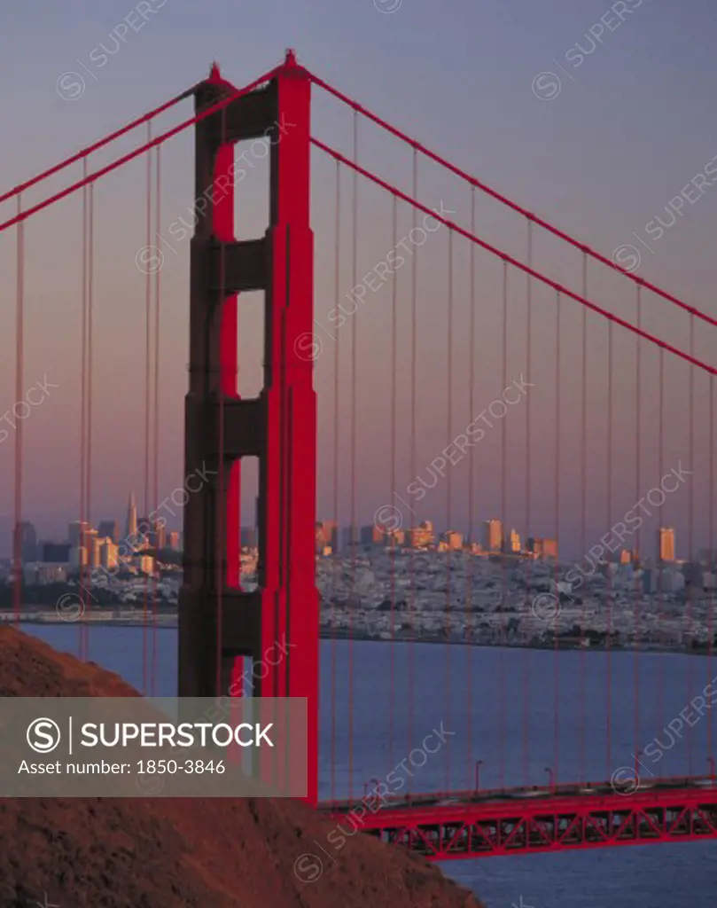 Usa, California, San Francisco, Golden Gate Bridge At Dusk With City Behind